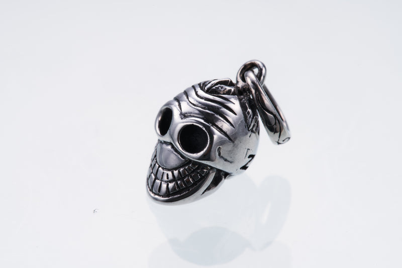 Tibetan Smile Skull Charm-ZOCALO.JAPAN